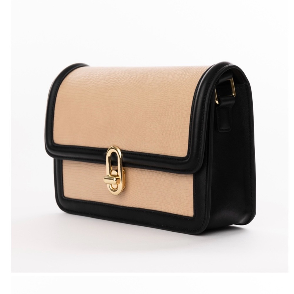 Chic Black and Tan Crossbody Bag with Gold Accent